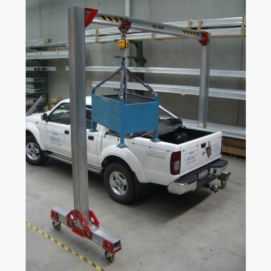 Mobitrac modular crane lifting into ute