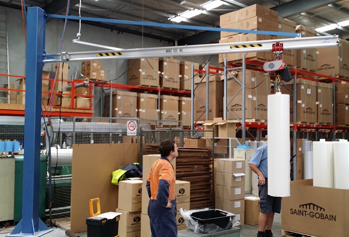 Altrac jib crane lifts 125kg rolls of foam to load into cutting machine