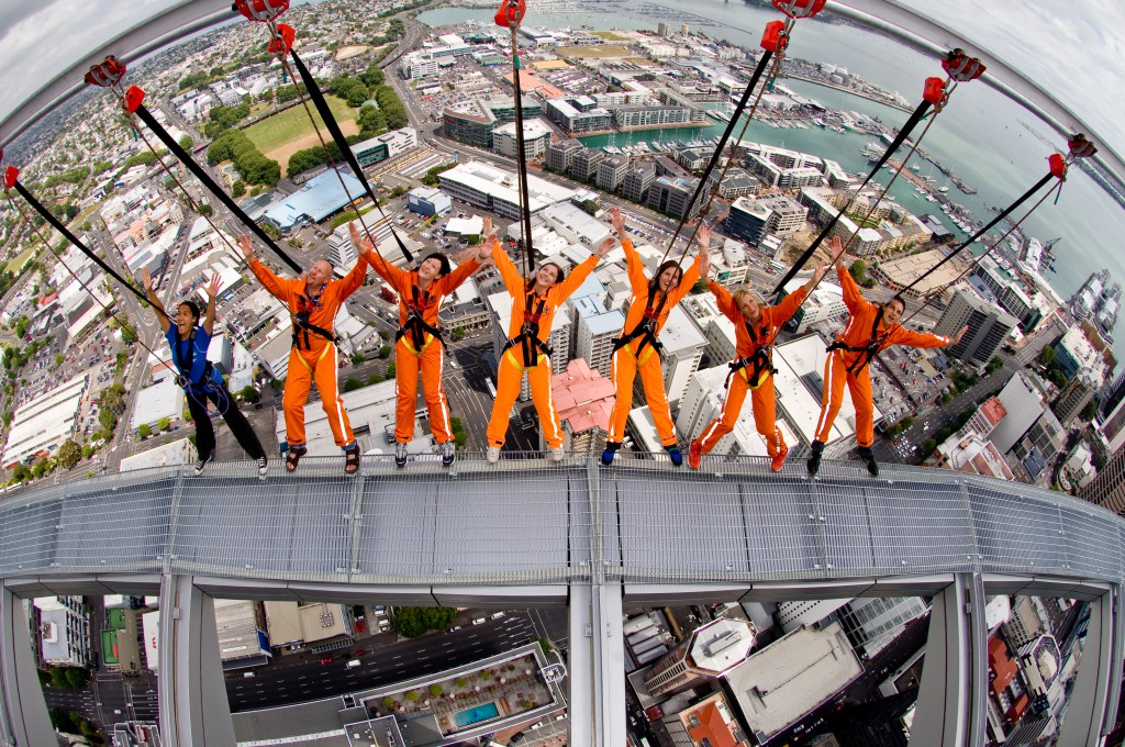 Visitors at Sky Walk in harnesses attached to the Altrac rail system.